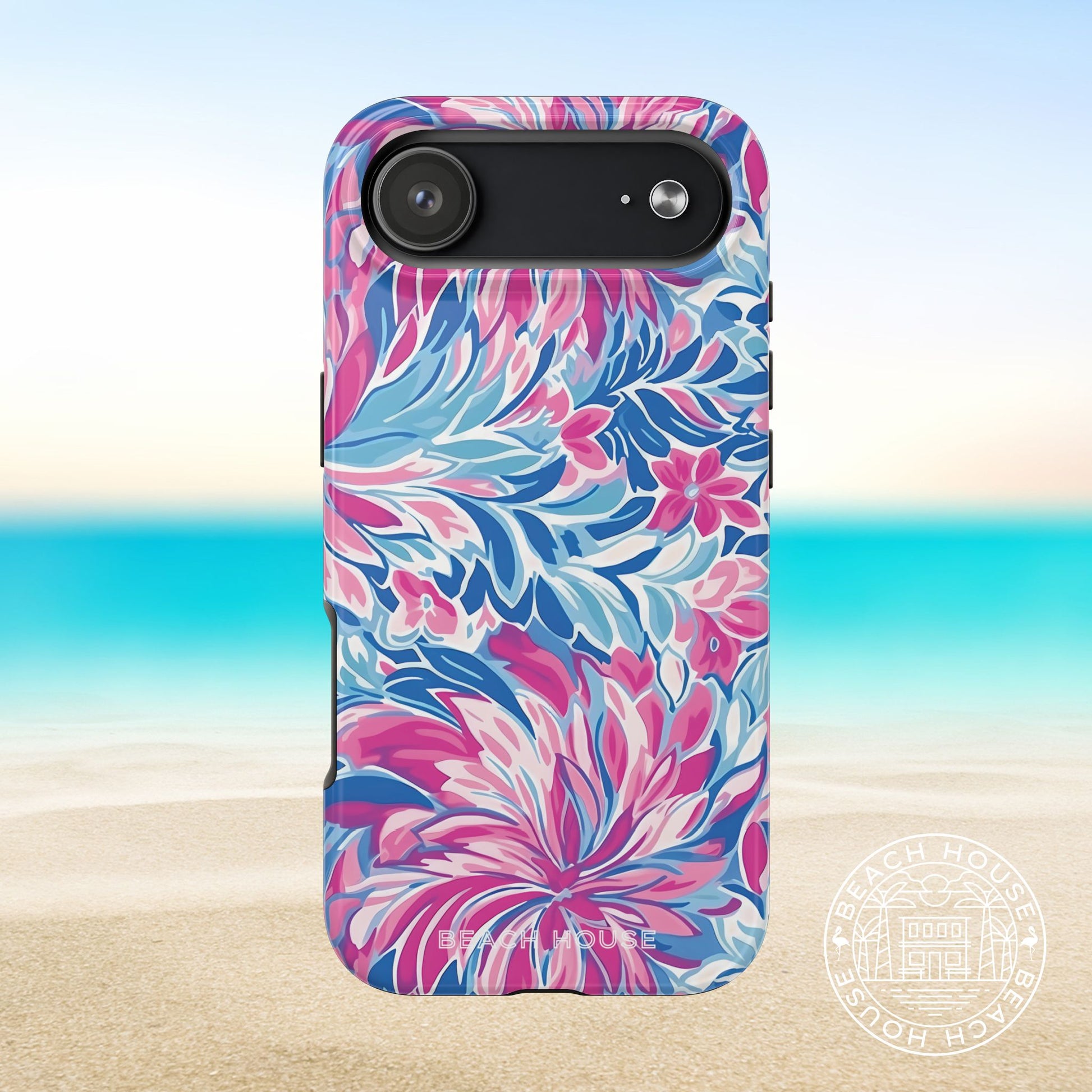 Destin Tough Case for iPhone 17 Air with pink and blue floral pattern on a beach background