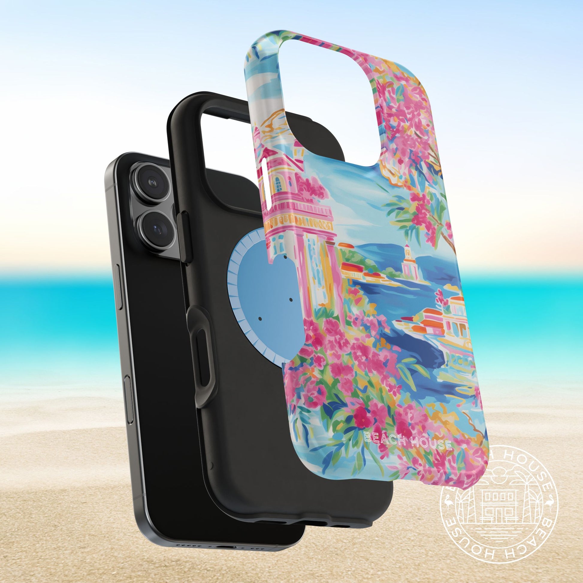 Layers of the Positano MagSafe Tough Case for iPhone with beach house design on a beach background