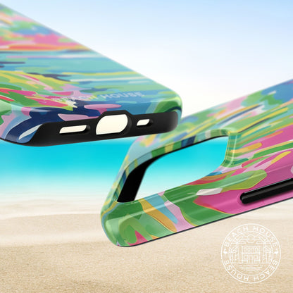 Top and bottom views of the Delray Tough case for iPhone with tropical design on a beach background