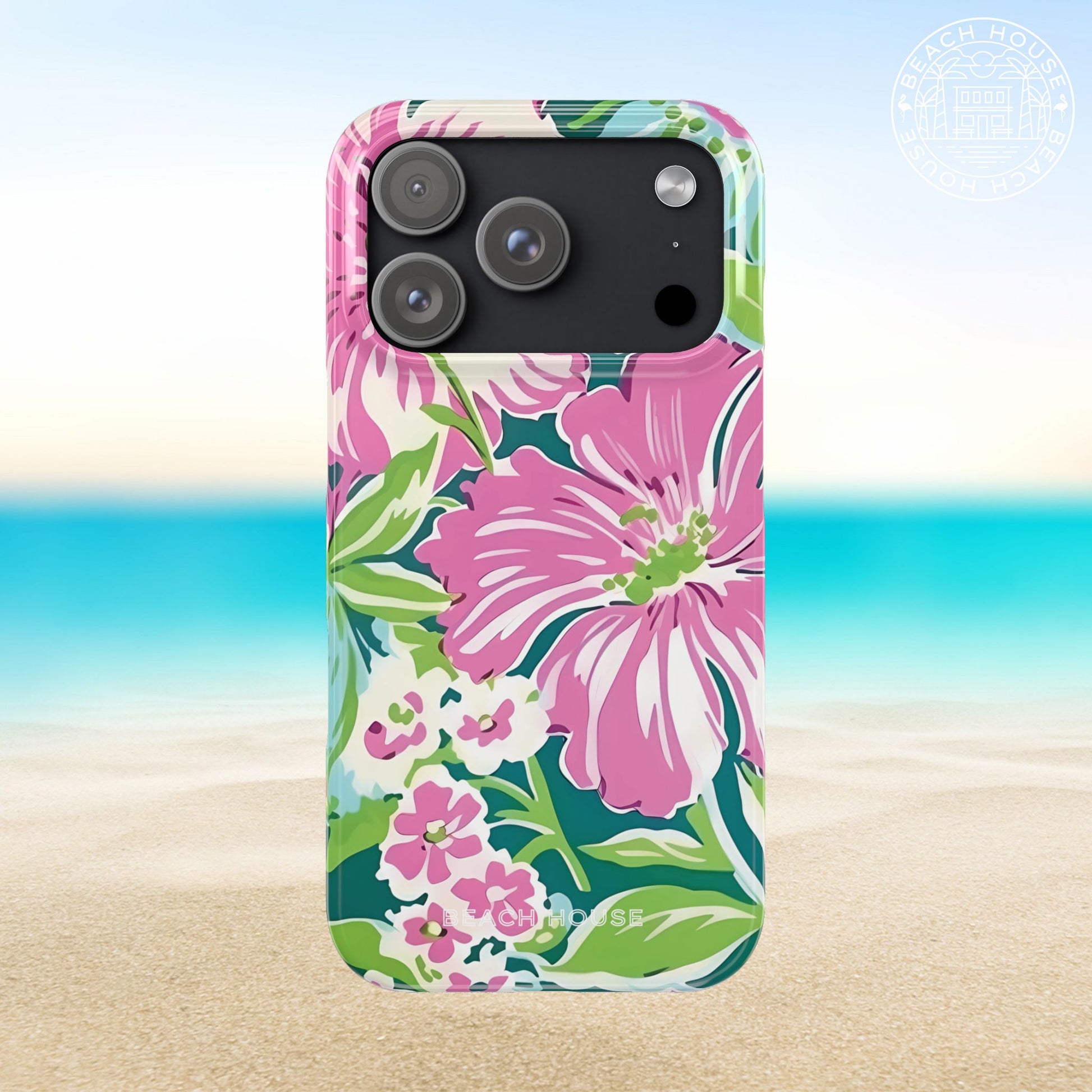 Seaside Slim Case for iPhone 17 Pro with pink floral design on a beach background