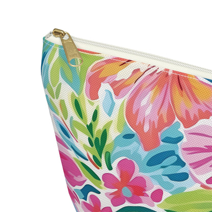 Floral patterned pouch with a gold zipper on a white background