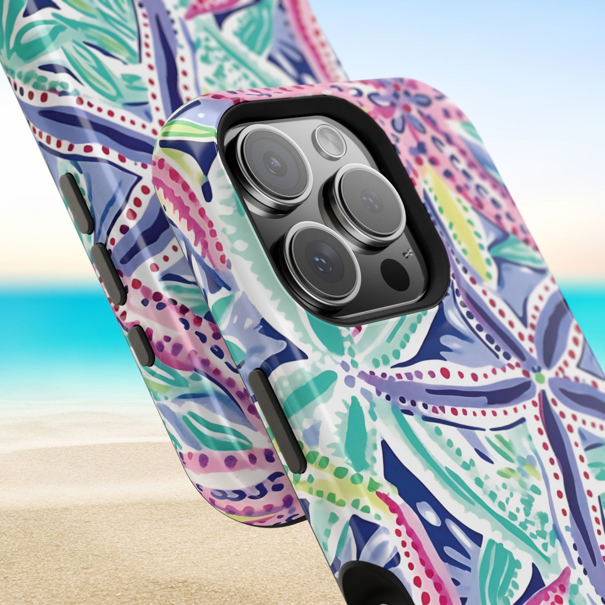 Close up views of Siesta Key MagSafe Tough Case for iPhone with a beach background