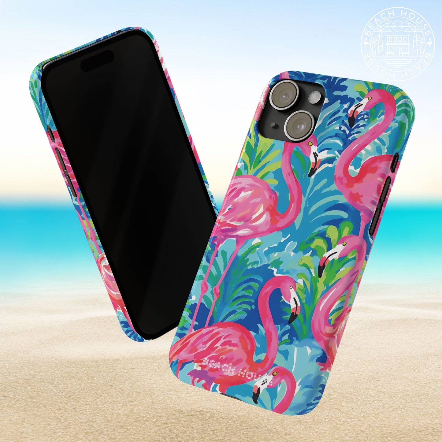 Front and back view of Key Largo Slim Case for iPhone with flamingo design on a beach background