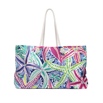 Back view of the Colorful starfish patterned Siesta Key Weekender Tote Bag on a white background