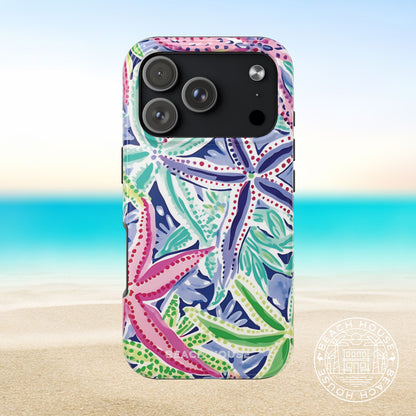 Siesta Key Tough Case for iPhone 17 Pro with a floral pattern on a beach background