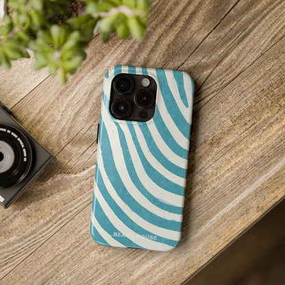 Holmes Beach Tough Case for iPhone with blue and white wave pattern on a wooden surface