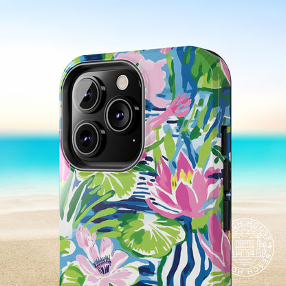Close up view of the Everglades Tough Case for iPhone with colorful floral design on a beach background