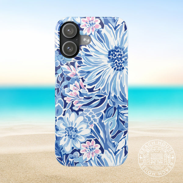 Huntington Slim Case for iPhone 17 with blue and pink flowers on a beach background