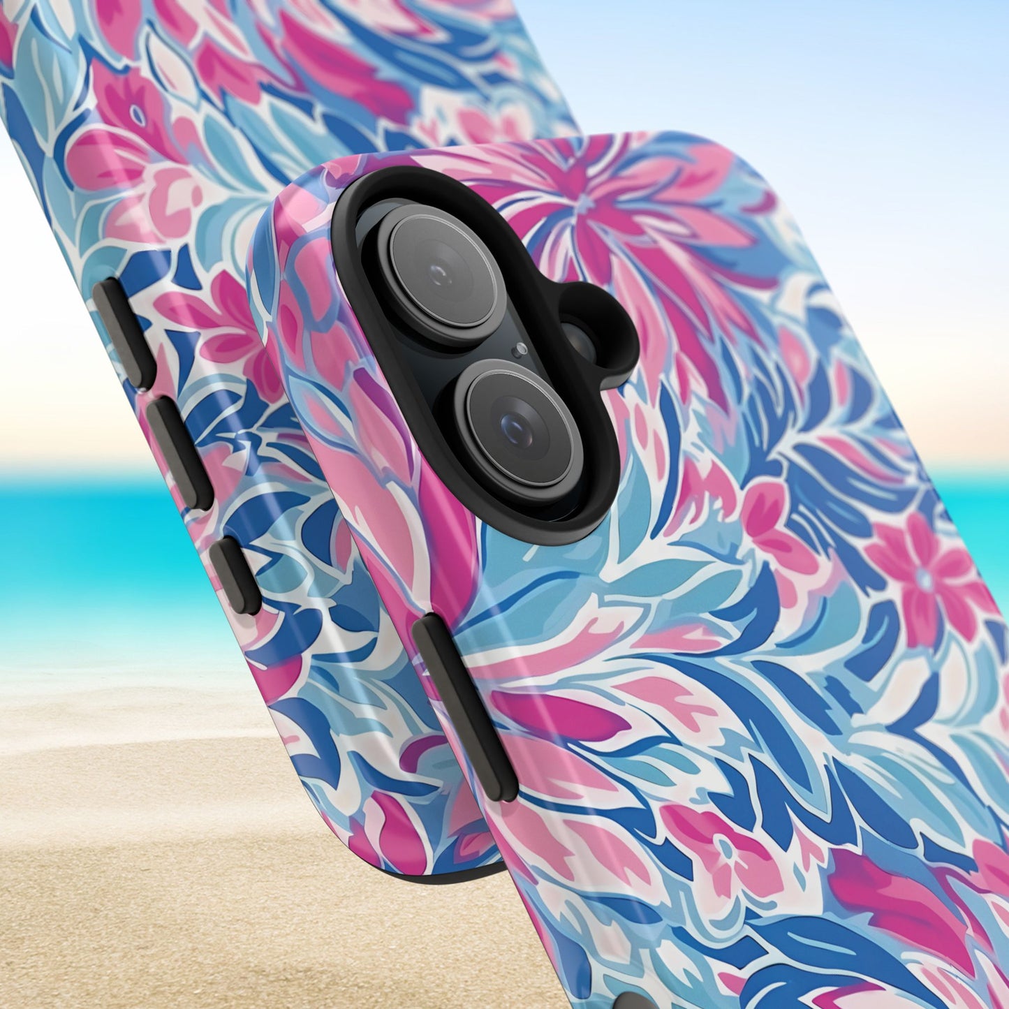 Destin Tough Case for iPhone with pink and blue floral pattern on a beach background