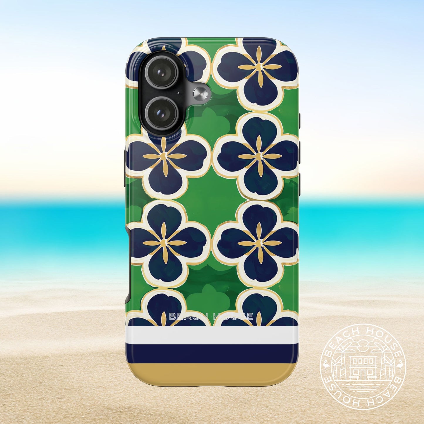 South Bend Tough Case for iPhone 17 with floral design on a beach background