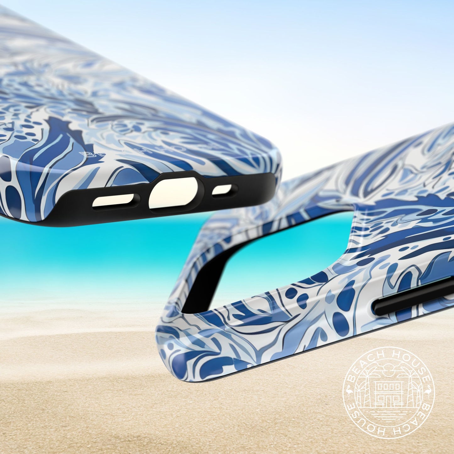 Blue and white patterned Nags Head case for iPhone on a beach background