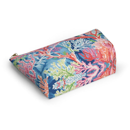 Colorful rectangular pillow with coral and sea-themed pattern on a white background