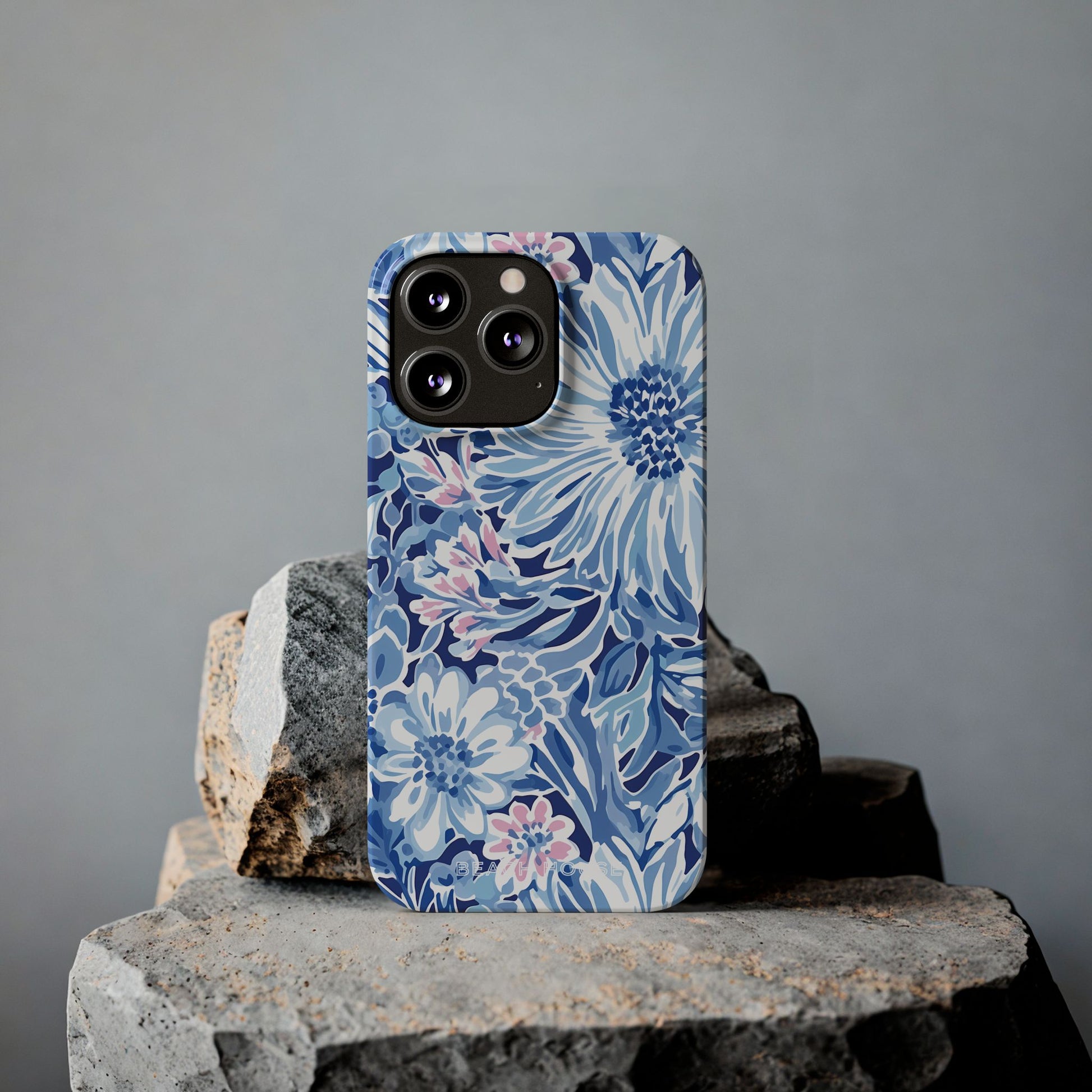 Huntington Slim Case for iPhone with blue and pink coastal pattern on a gray background