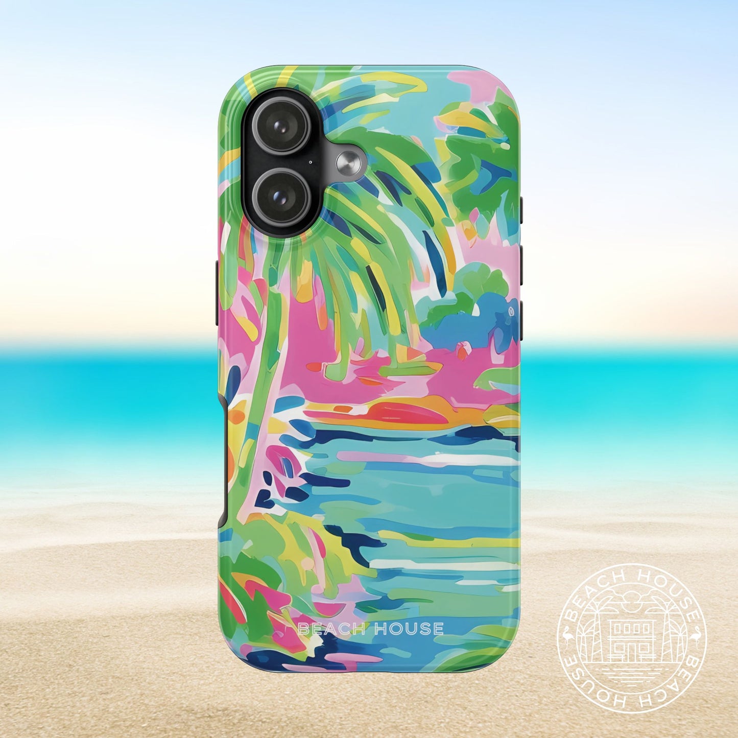 Delray Tough phone case with palm tree design and beach design on a beach background
