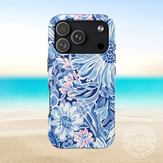 Huntington Tough Case for iPhone 17 Pro with blue floral pattern on a beach background