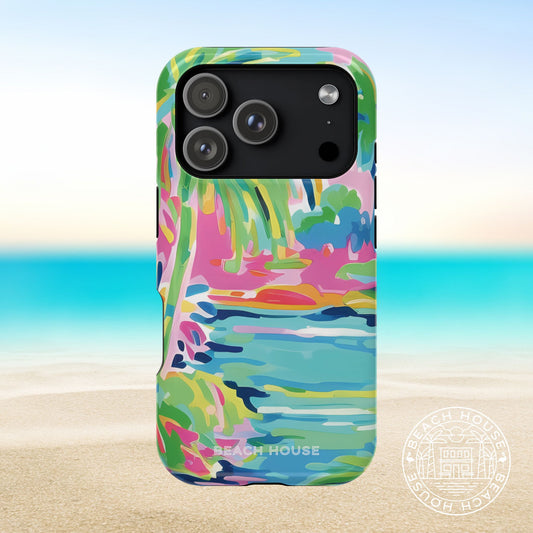 Colorful Delray MagSafe Tough Case for iPhone 17 Pro with a beach theme on a blurred beach background