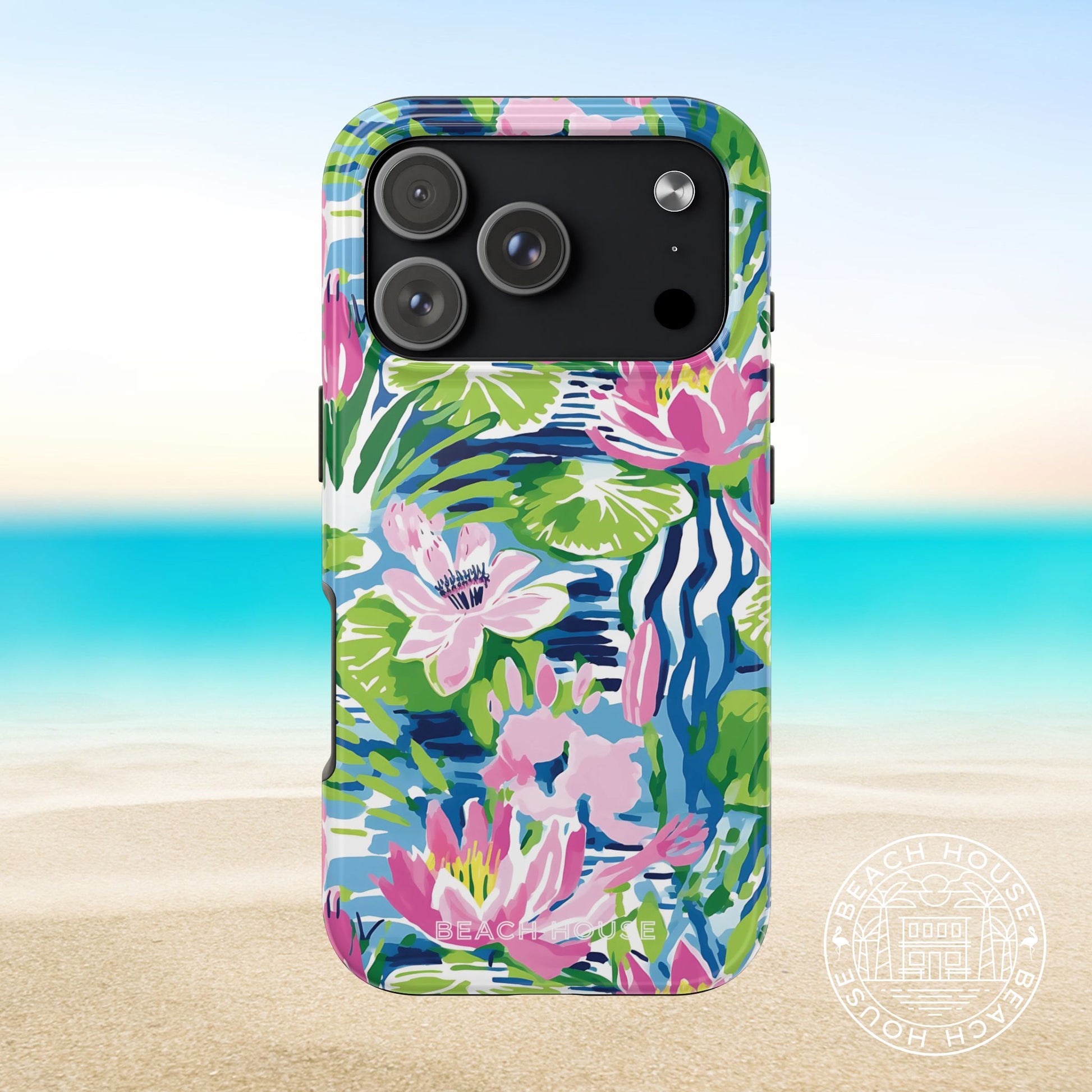 Everglades Tough Case for iPhone 17 Pro with colorful floral design on a beach background