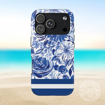 Lexington Tough Case for iPhone 17 Pro with blue floral design on a beach background