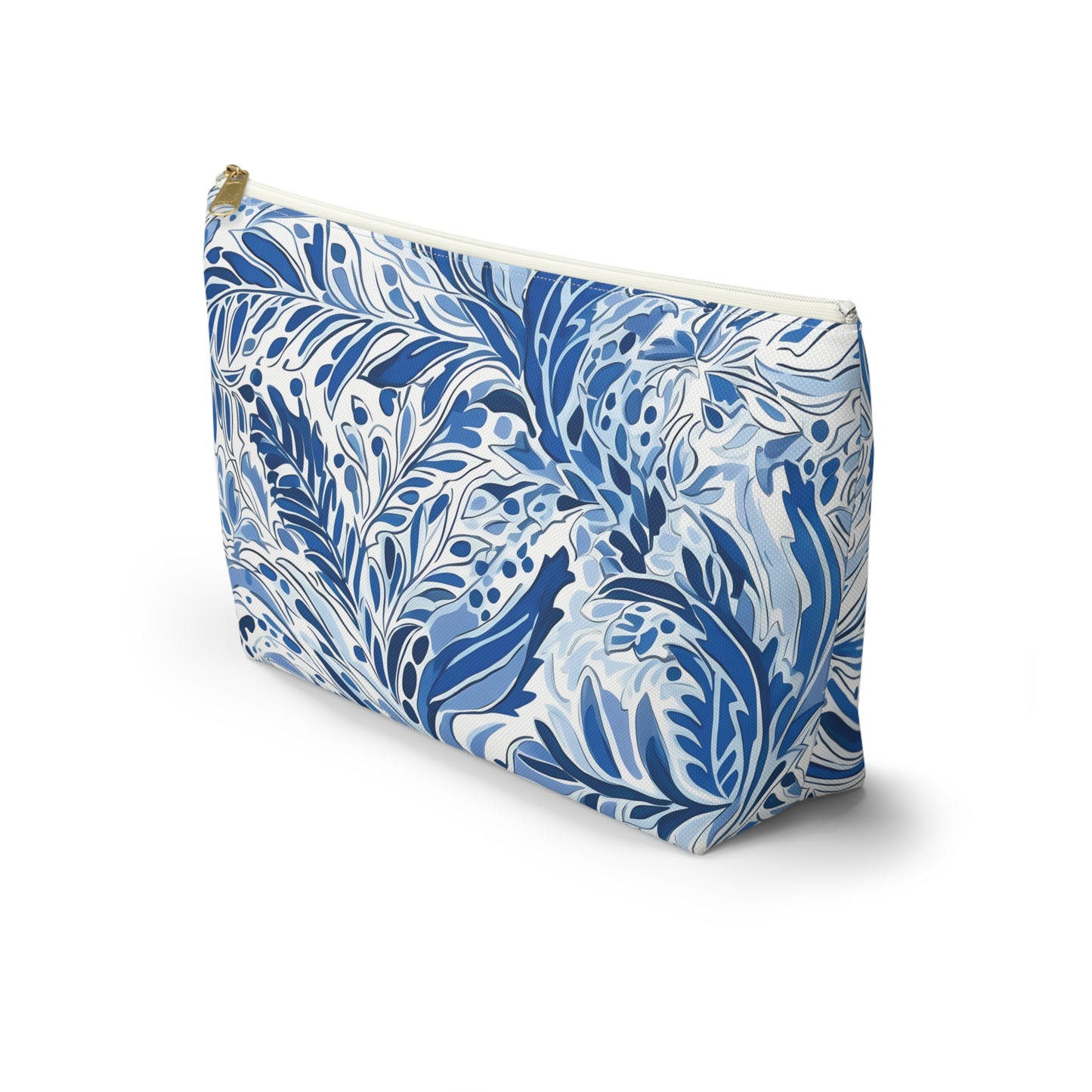 Blue and white floral patterned pouch on a white background
