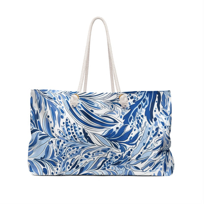 Reverse angle of Nags Head Weekender Tote bag with blue and white tropical pattern on a white background.