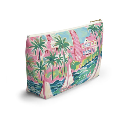 Colorful pouch with tropical design featuring palm trees and a house on a white background