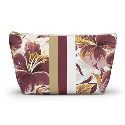 Floral-patterned pouch with a gold stripe on a white background
