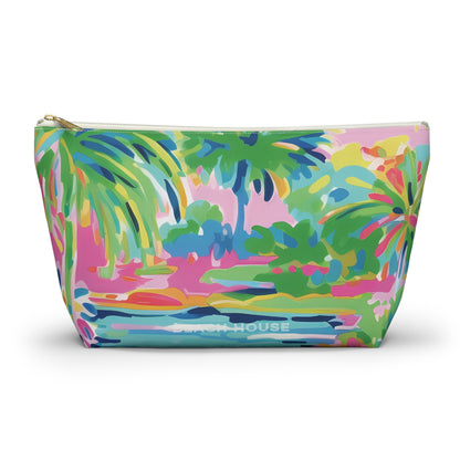 Colorful palm tree patterned pouch with 'Beach House' branding on a white background