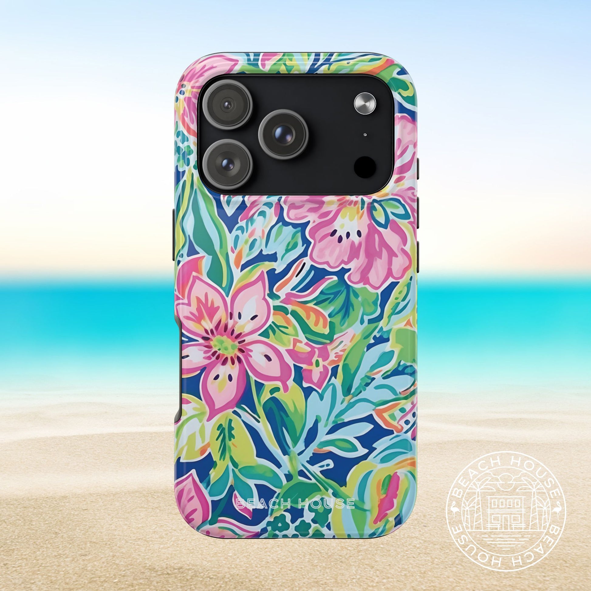 Fernandina Tough Case for iPhone 17 Pro with colorful floral design on a beach background