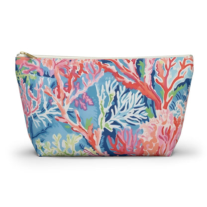 Colorful coral-patterned pouch on a white background