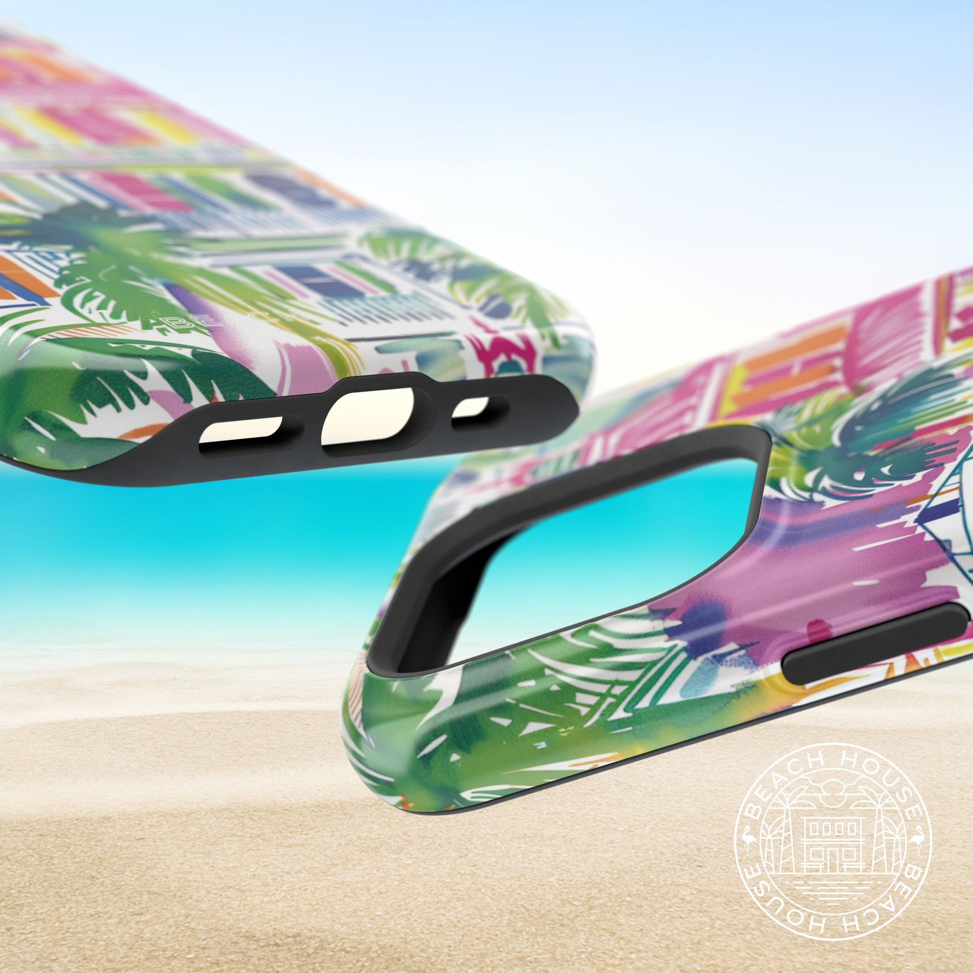 Top and bottom views of the George Town MagSafe Tough Case for iPhone on a sandy background