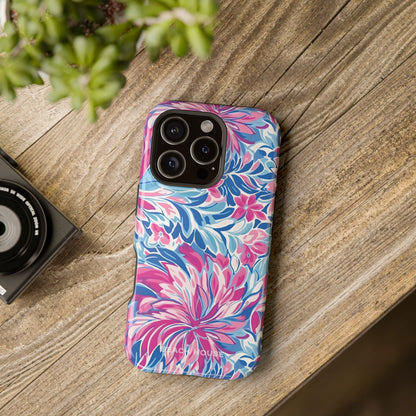 Destin Tough Phone case for iPhone with pink and blue floral pattern on a wooden surface