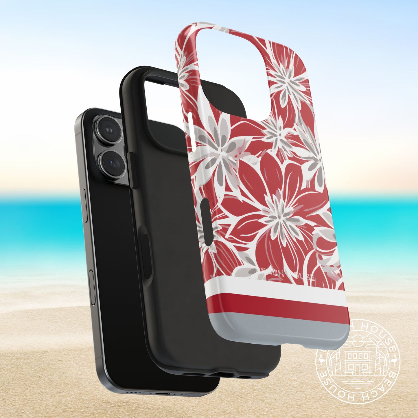 Layers of Columbus Tough case for iPhone with red and white floral pattern on a beach background
