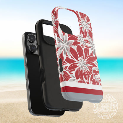 Layers of Columbus Tough case for iPhone with red and white floral pattern on a beach background