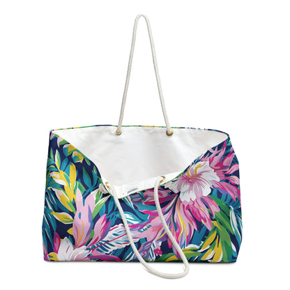 Open view of Tropical floral patterned Playa Hermosa Weekender Tote Bag with a white rope handle on a white background
