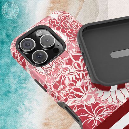 Norman MagSafe Tough Case for iPhone with red floral and stripied pattern on a textured surface