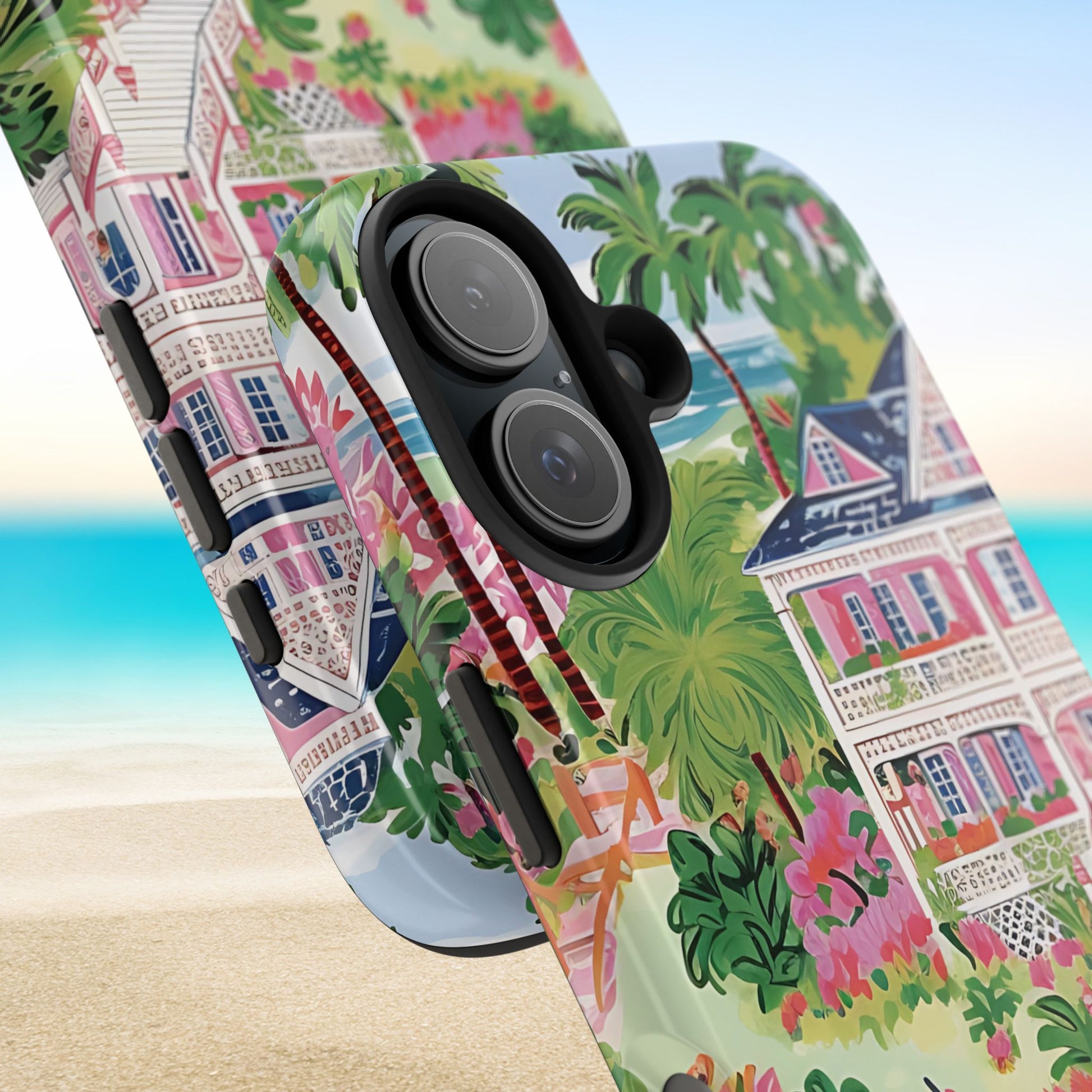 Close up views of the Charleston Tough Case for iPhone with colorful tropical design featuring houses and palm trees on a beach background