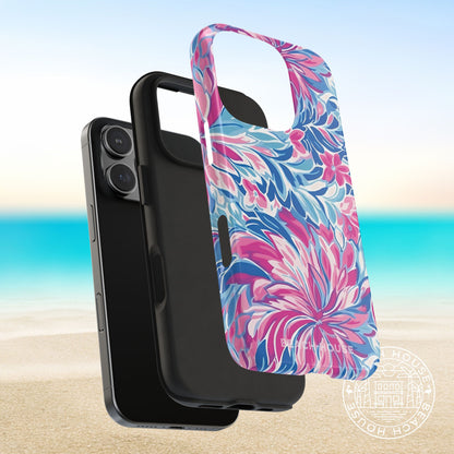Layers of the Destin Tough Case for iPhone with pink and blue floral pattern on a beach background
