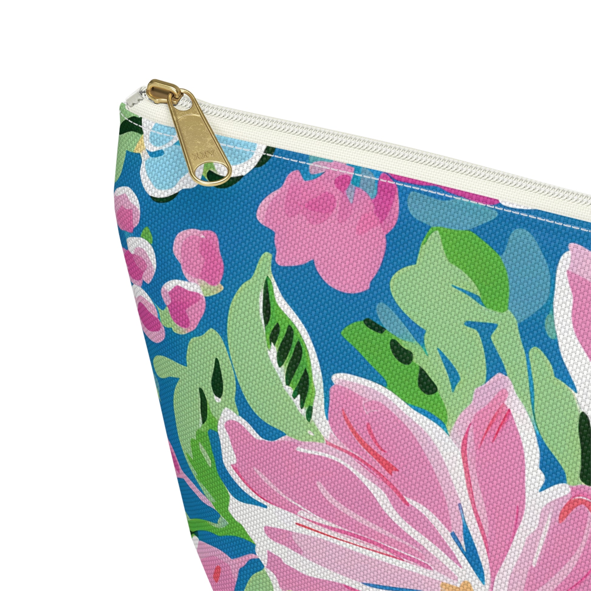 Floral-patterned pouch with a gold zipper on a white background
