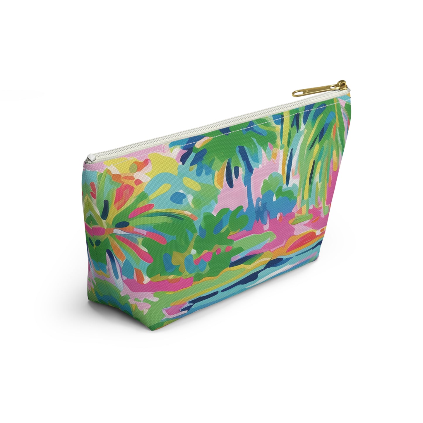 Colorful makeup bag with a tropical leaf pattern on a white background