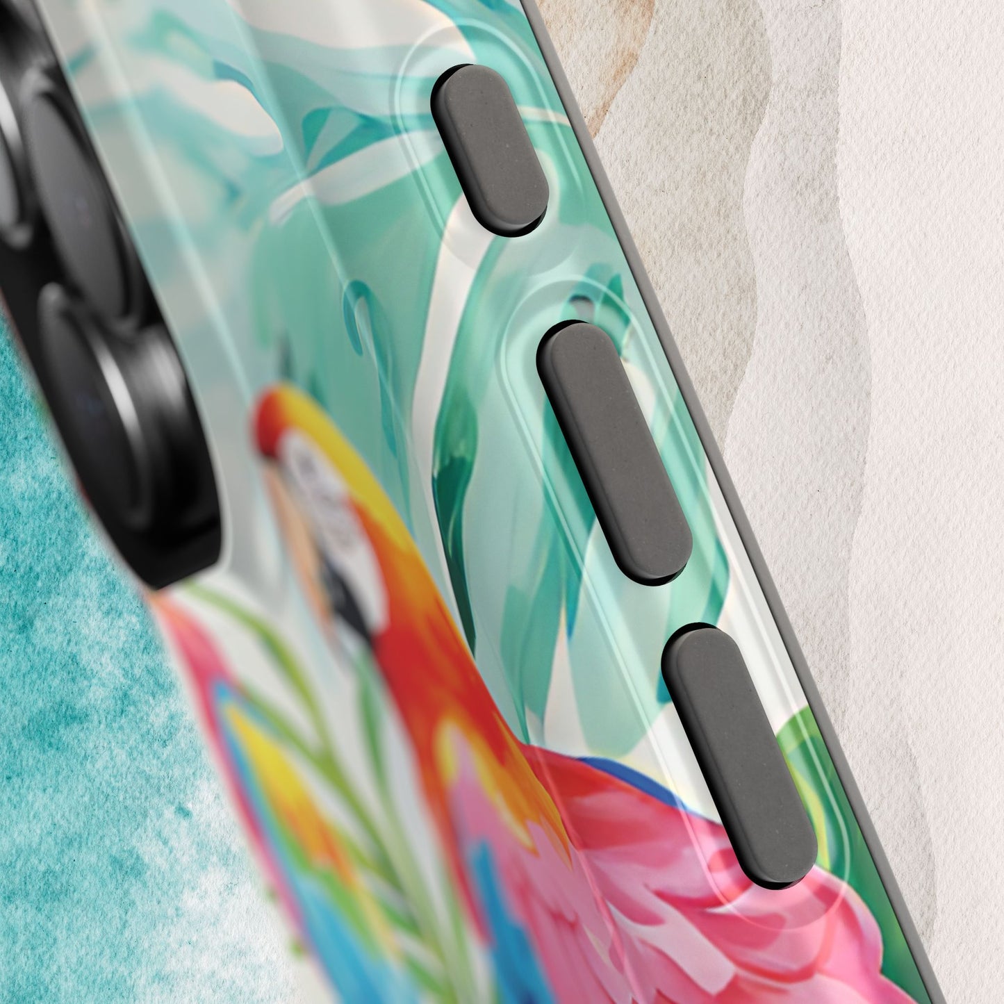 View of buttons on the Copacabana MagSafe Tough Case for iPhone with colorful tropical design on a textured surface