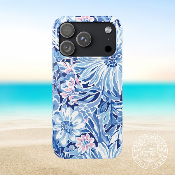 Huntington Slim Case for iPhone 17 Pro with blue floral design on a beach background