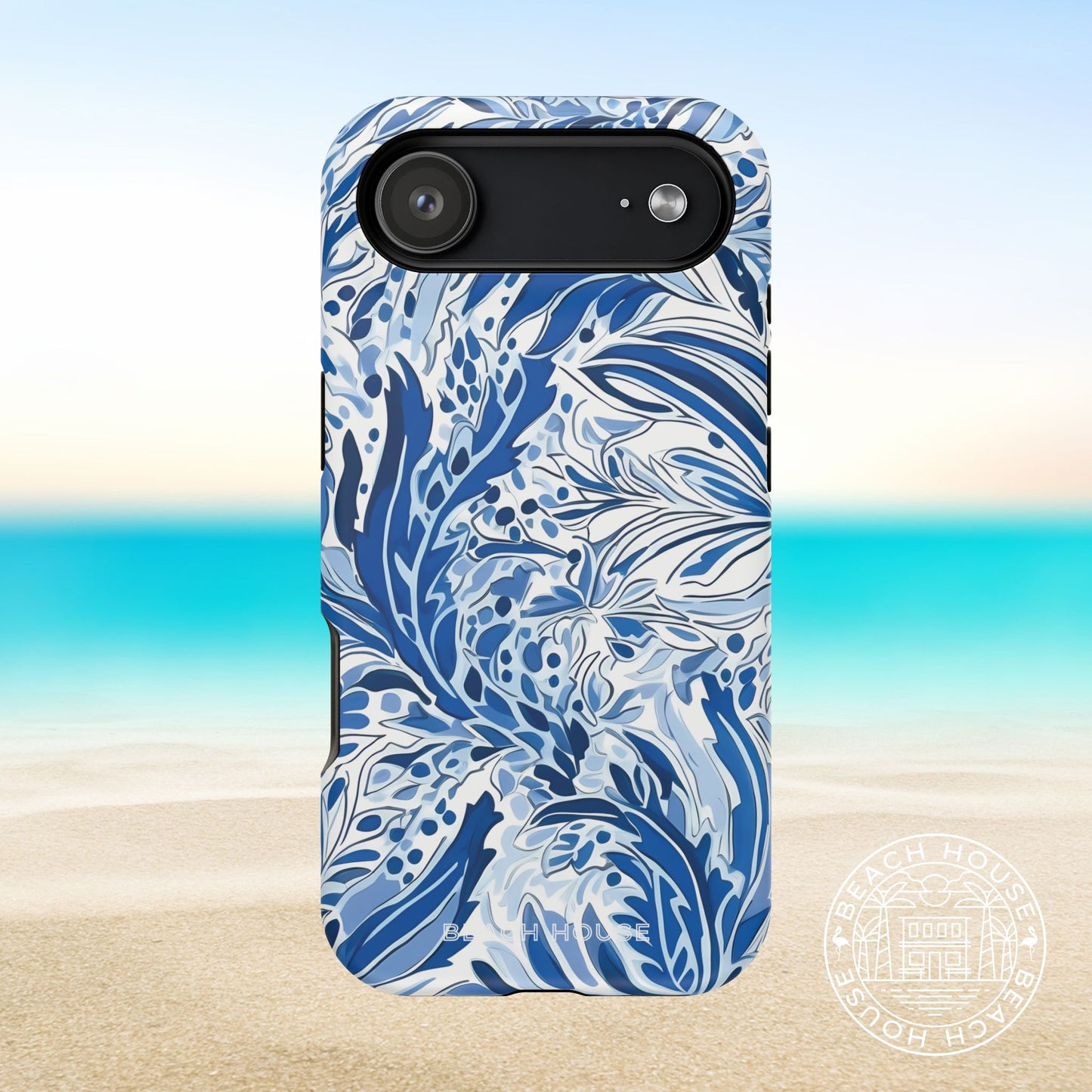 Nags Head MagSafe Tough Case for iPhone 17 Air with blue and white floral pattern on a beach background