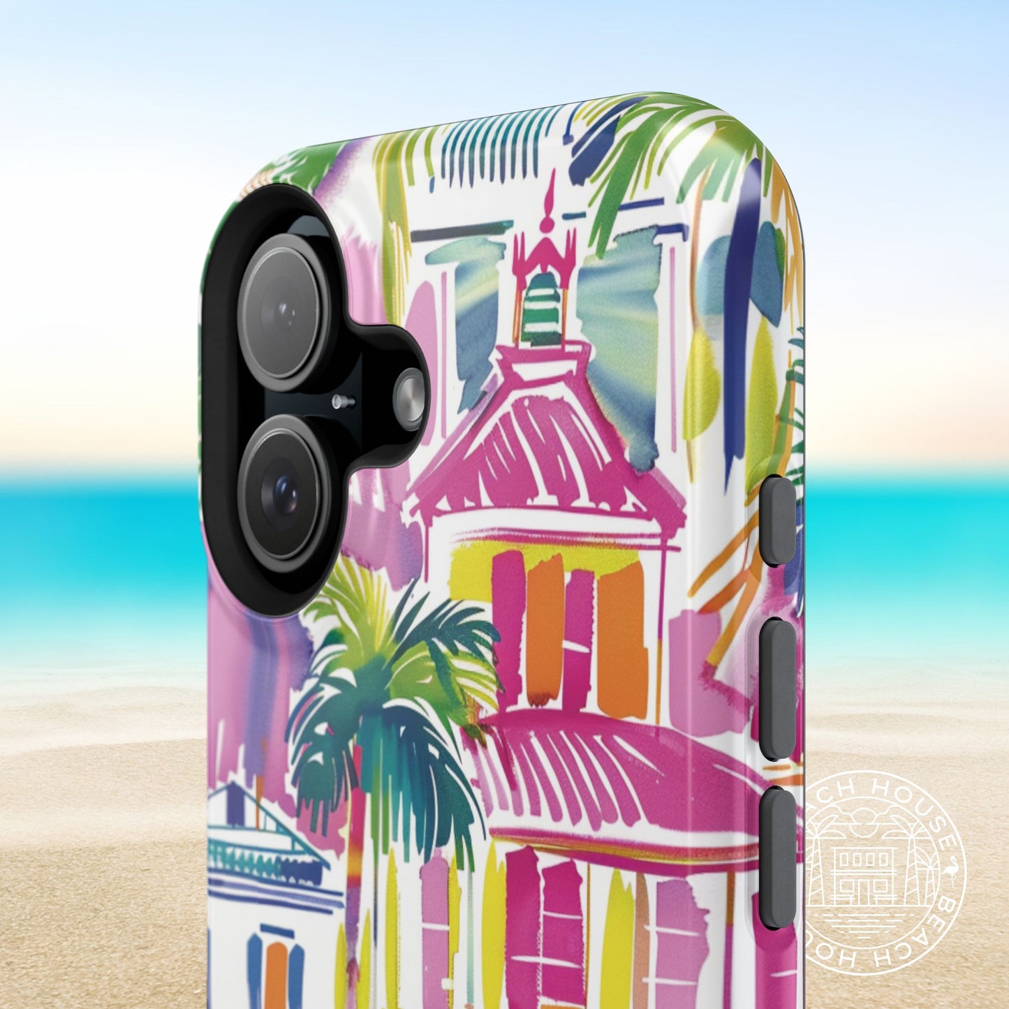 Colorful George Town MagSafe Tough Case for iPhone with tropical design featuring palm trees and a building on a beach background.