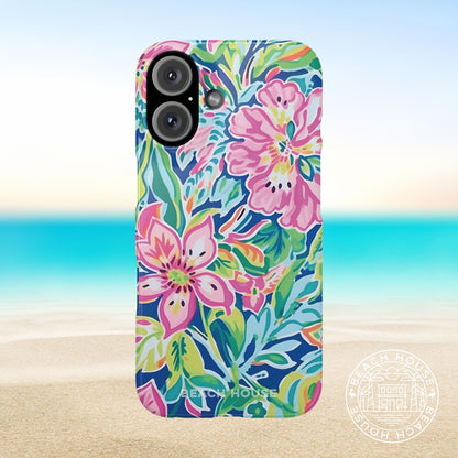 Phone case with colorful floral design on a beach background