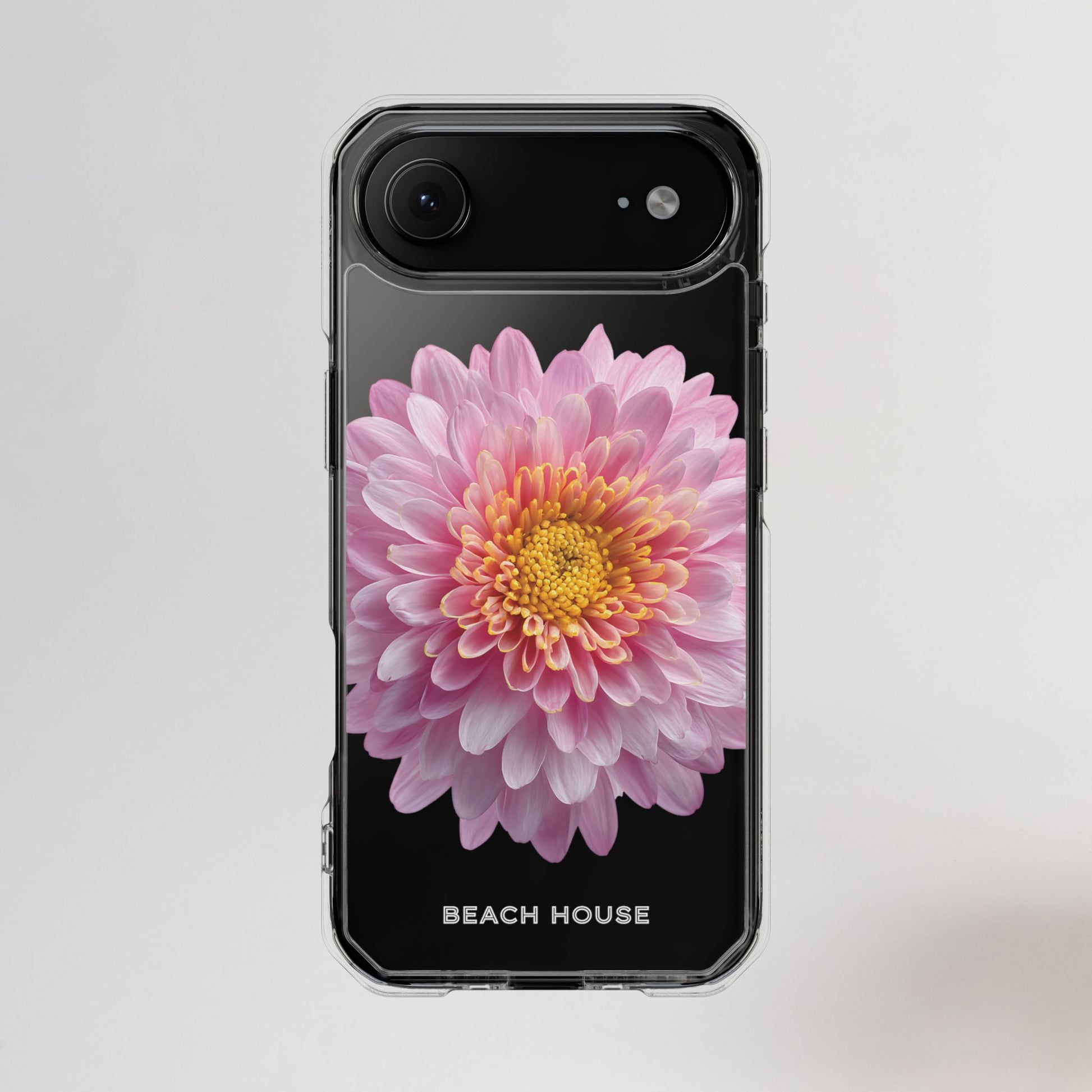 Phone case with a pink flower design on a light gray background
