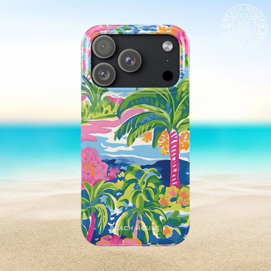 Kiawah Slim Case for iPhone 17 Pro with tropical design on a beach background
