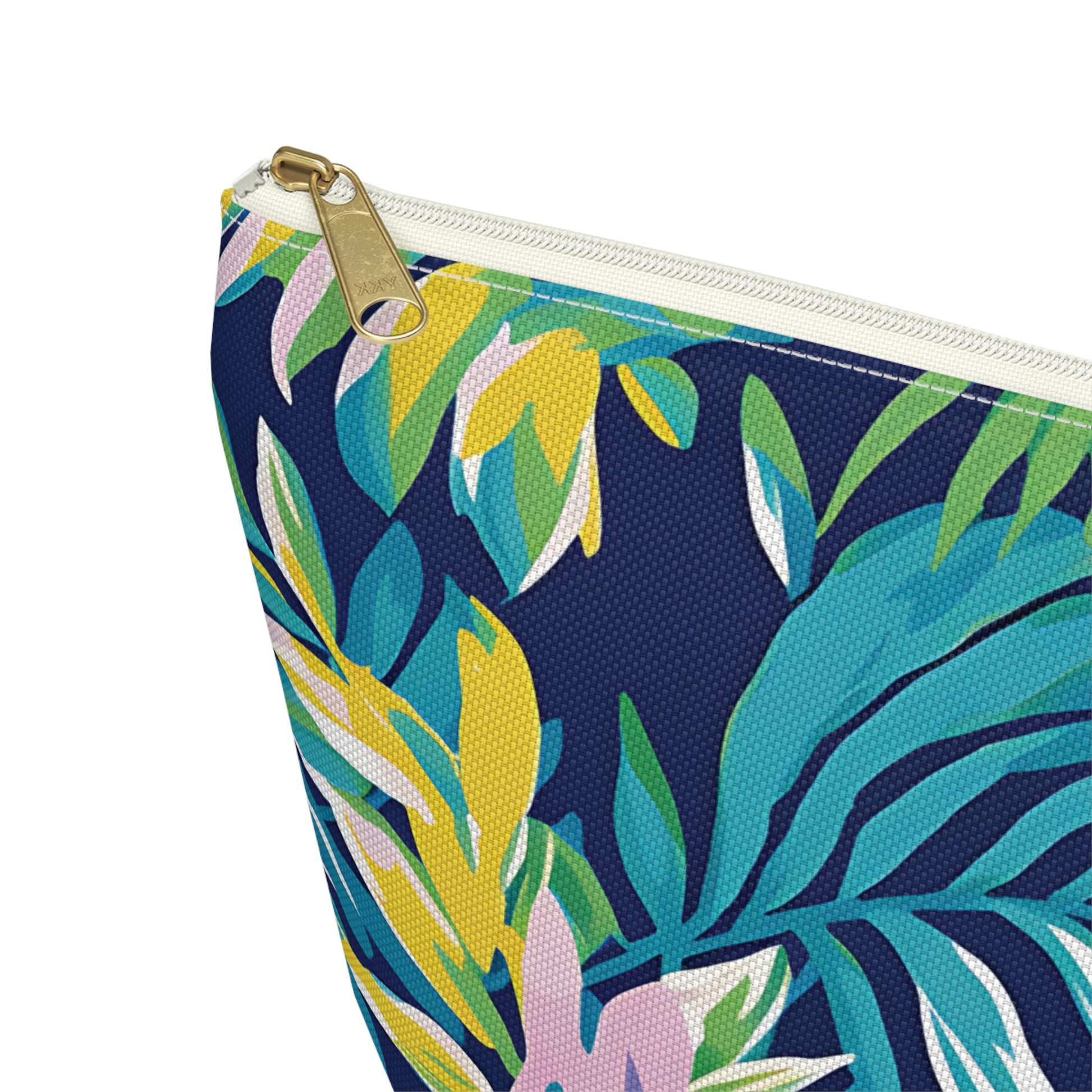 Pouch with tropical leaf pattern on a white background