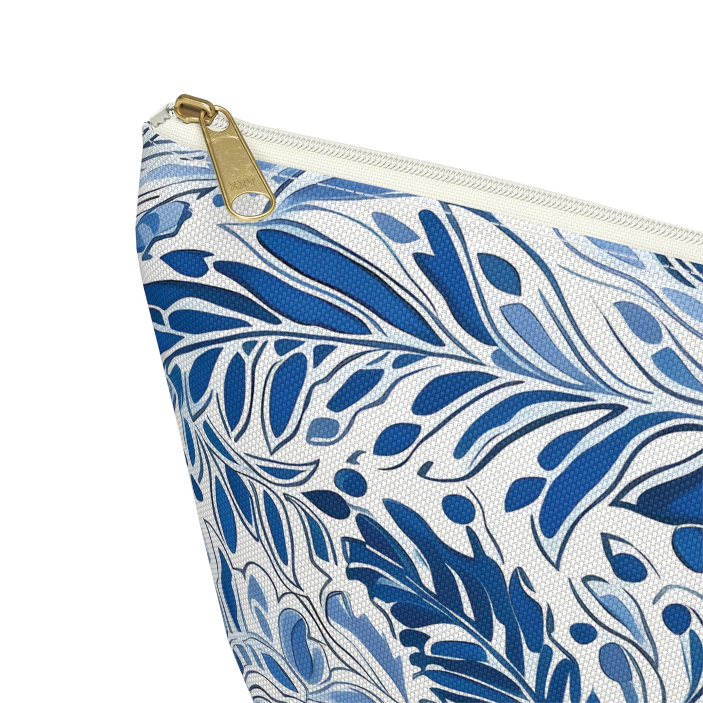 Zipper pouch with blue and white leaf pattern on a white background
