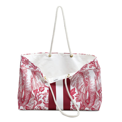 Tuscaloosa Weekender Tote Bag, slightly opened to review cream interior lining and exterior has red and white elephant pattern on a white background