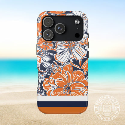 Charlottesville Tough Case for iPhone 17 Pro with orange and navy floral pattern on a beach background